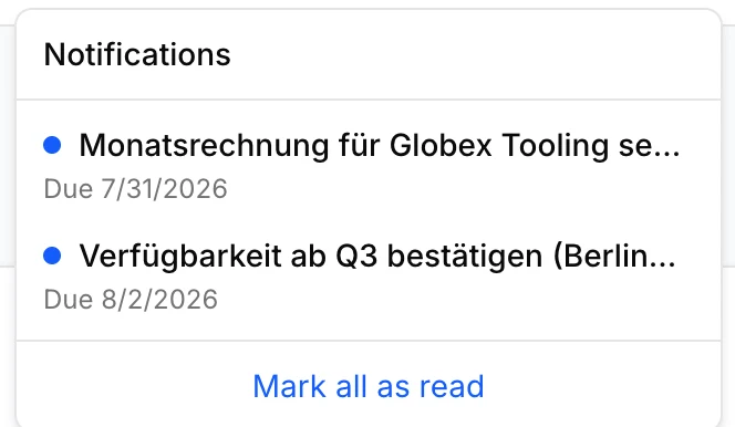 A Steerd notification popover with two reminders: a monthly invoice to send and an availability to confirm